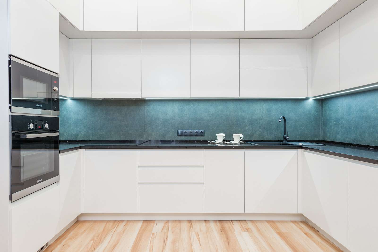 Interior of white modern kitchen with minimalist design