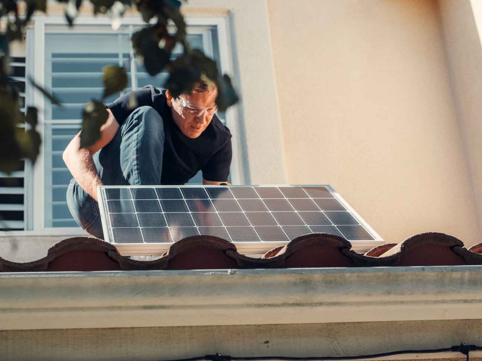 How To Use Dettol Disinfectant Liquid 1 A Man in Black Shirt Installing a Solar Panel on the Roof
