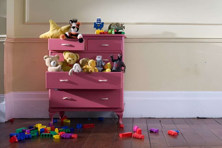 drawer of stuffed animals and toys