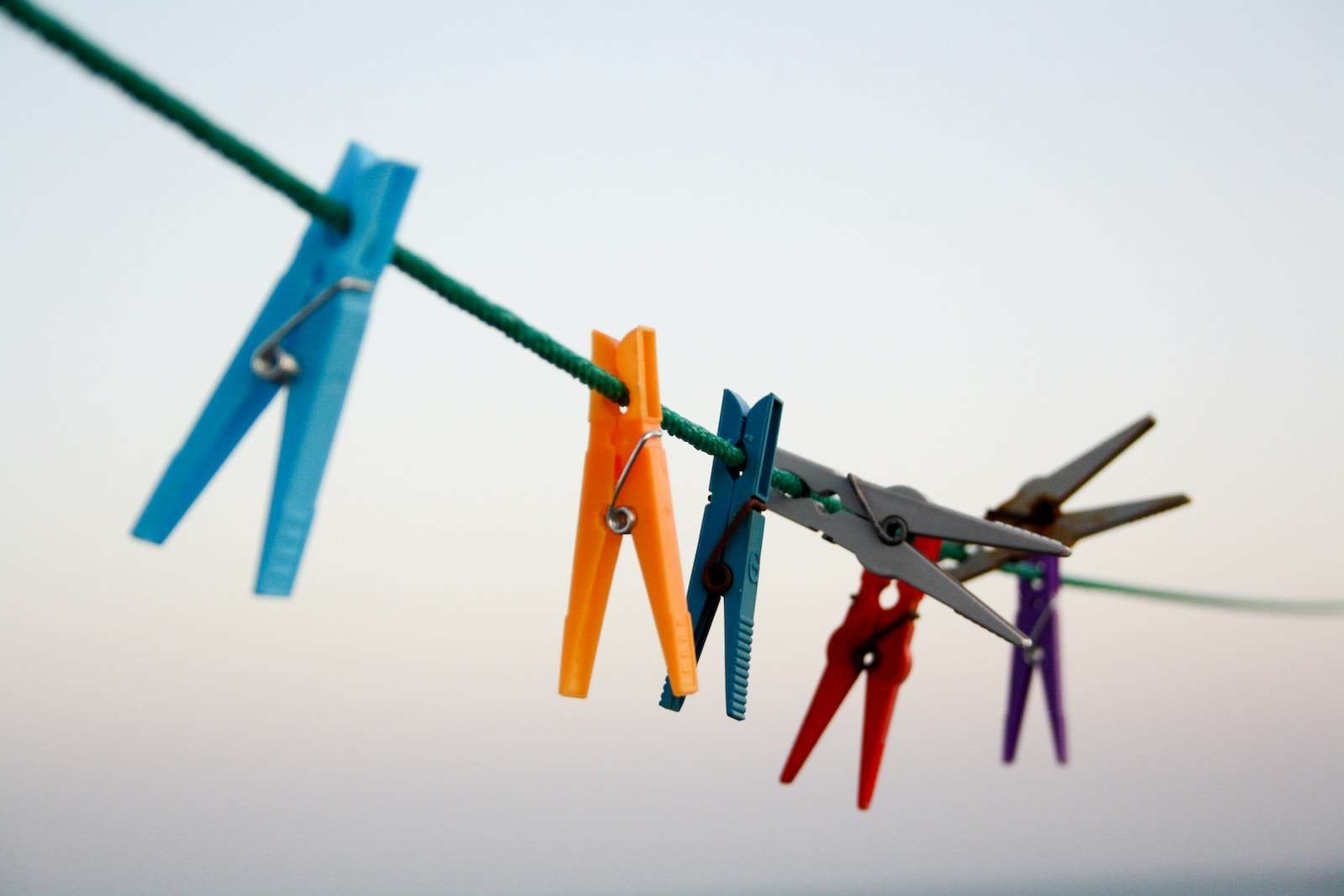 Keep It Fresh: How To Sanitize With Boiling Water 1 seven assorted-color clothes pegs hanging on rope